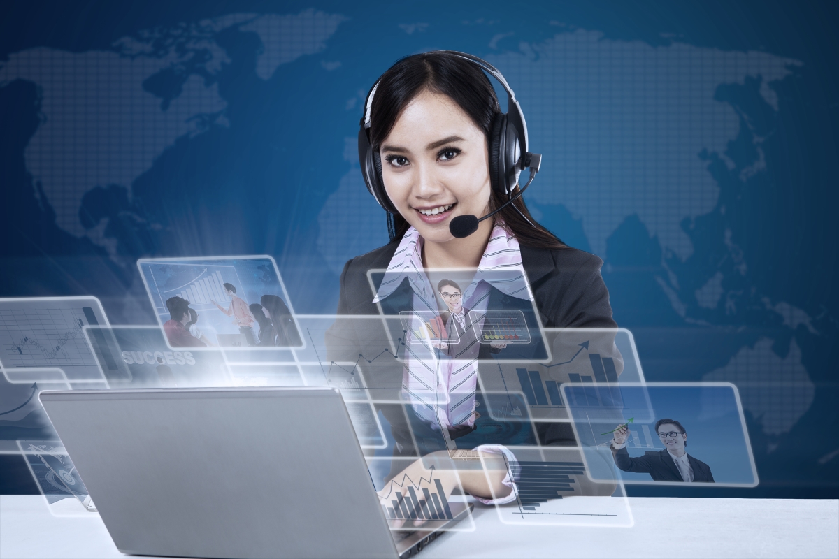 A virtual assistant using her laptop to provide you reasons to hire virtual assistants