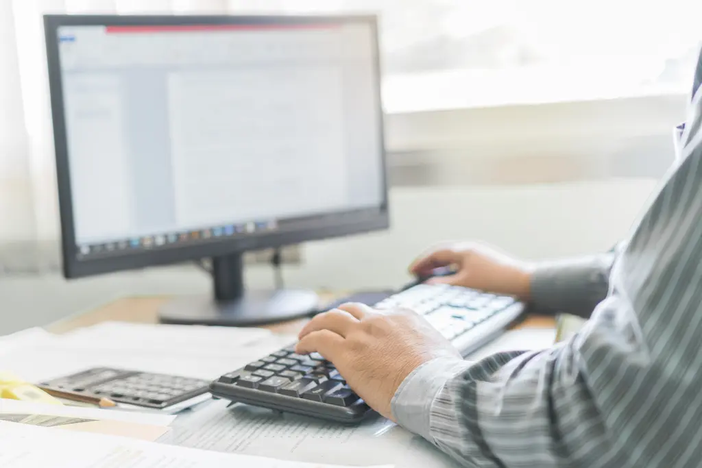 typing on keyboard in office for data entry job