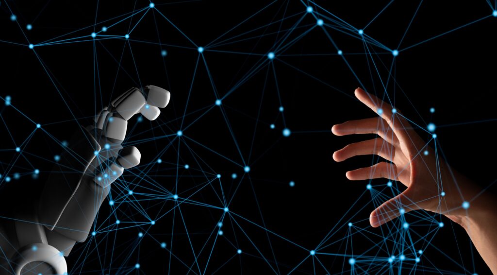 human hand and robot hand with network connection lines on black screen background