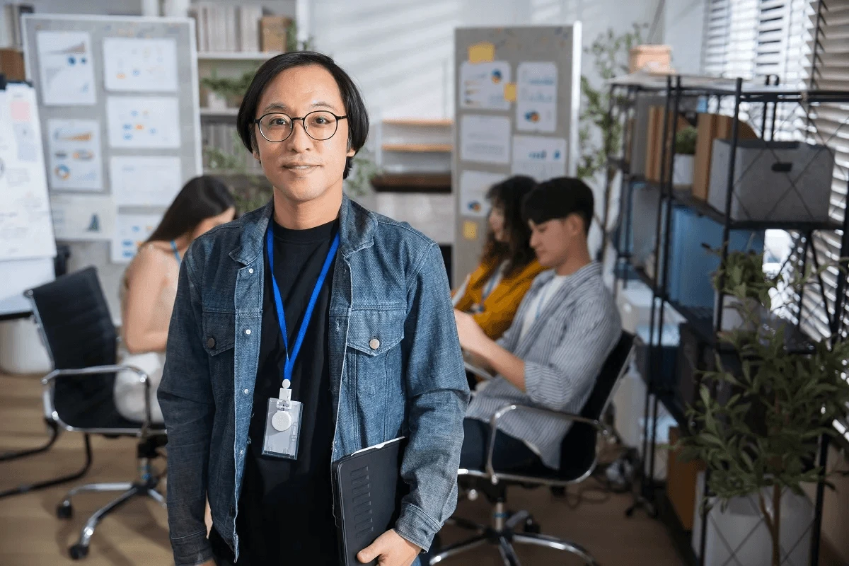 team leader of employer of record smiling