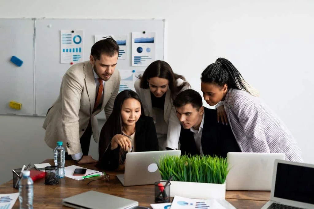 a team of project outsourcing professionals working on a project