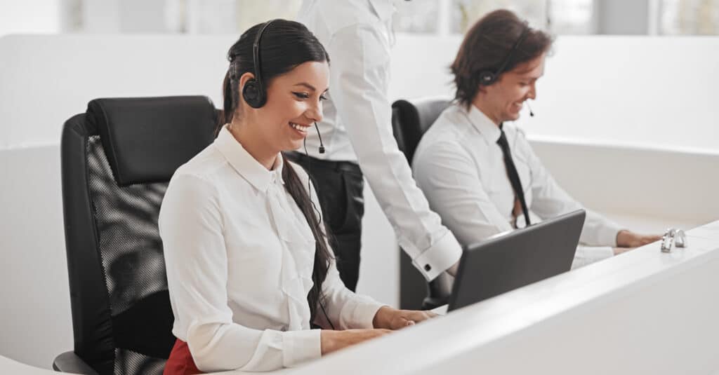 call center agents using laptops