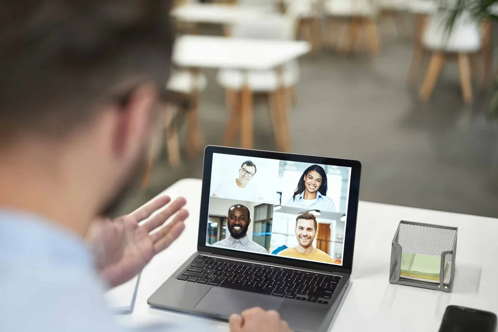 a business owner having a virtual meeting with his onshore team