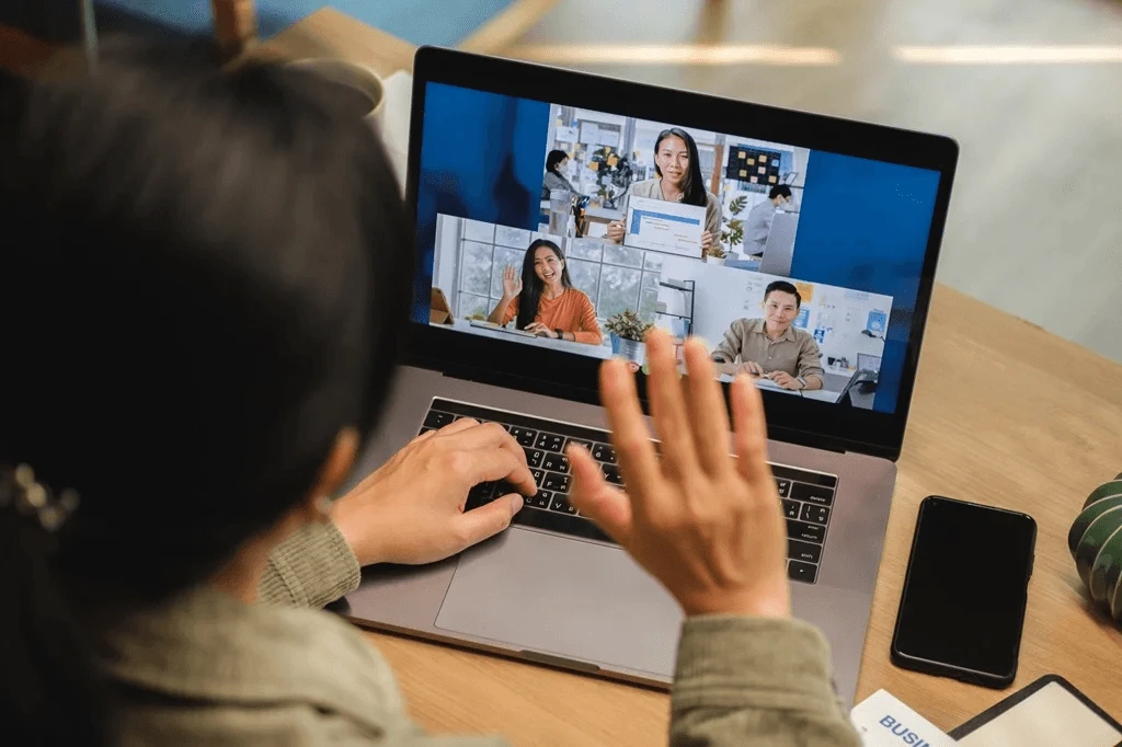 business owner having a virtual meeting with her outsourced Filipino digital marketing team