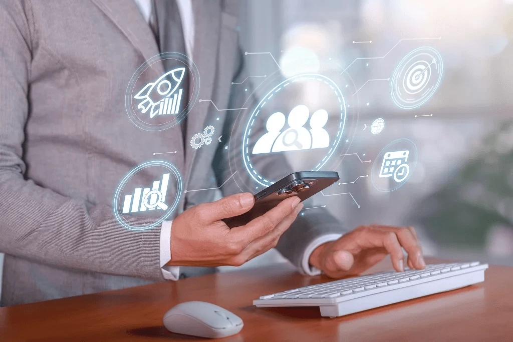 businessman using digital business via phone and desktop