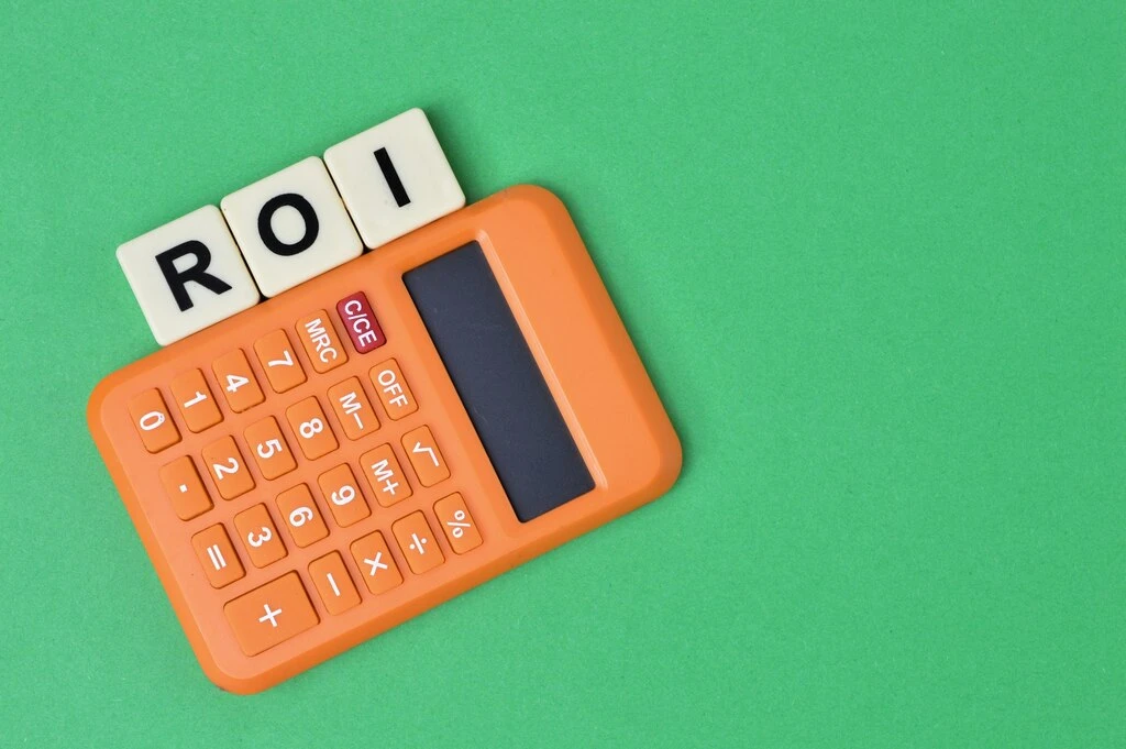 scrabble letters with text roi stands for return on investment