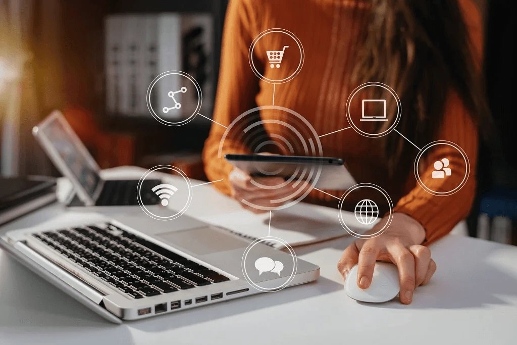 woman checking on multiple devices to check omnichannel engagement