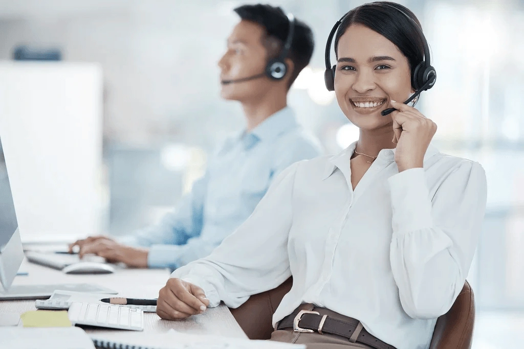 filipino call center agent happily working