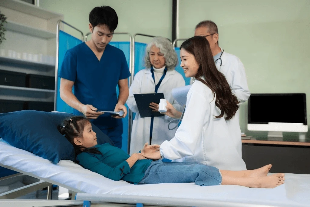 healthcare team accommodating a young female patient