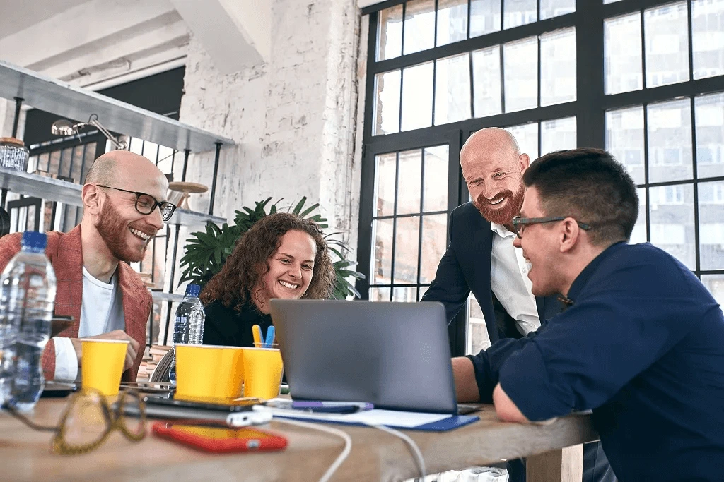 core members in a meeting discussing about recofusing on core functions