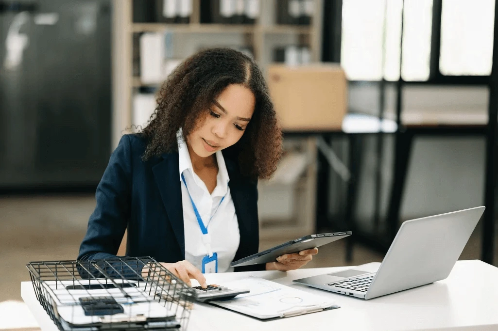 female employee working on outsourcing bookkeeping