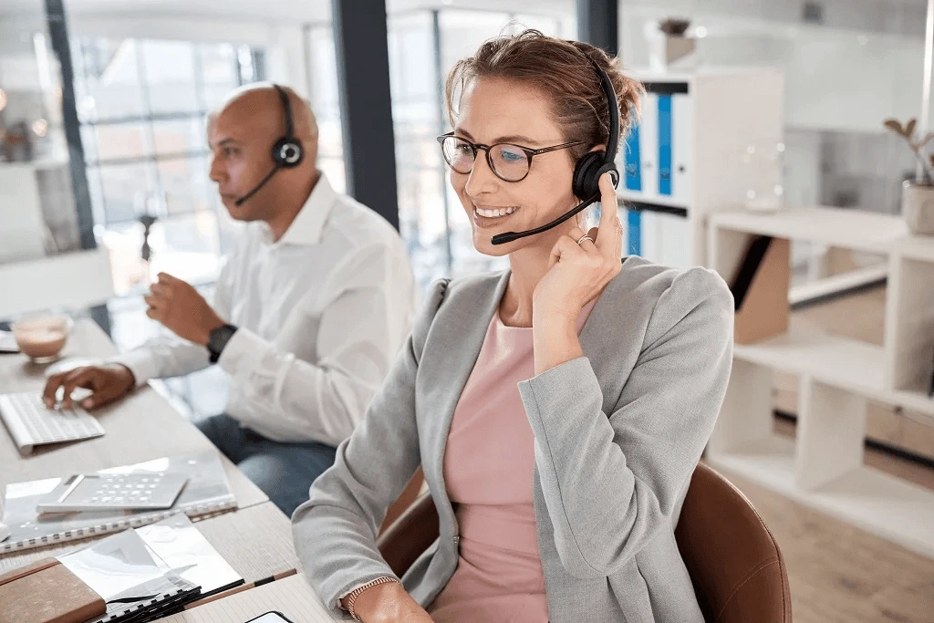 female on telesales department on call with a client