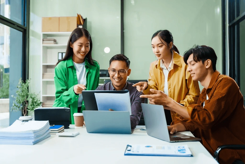 filipino outsourcing team in a huddle