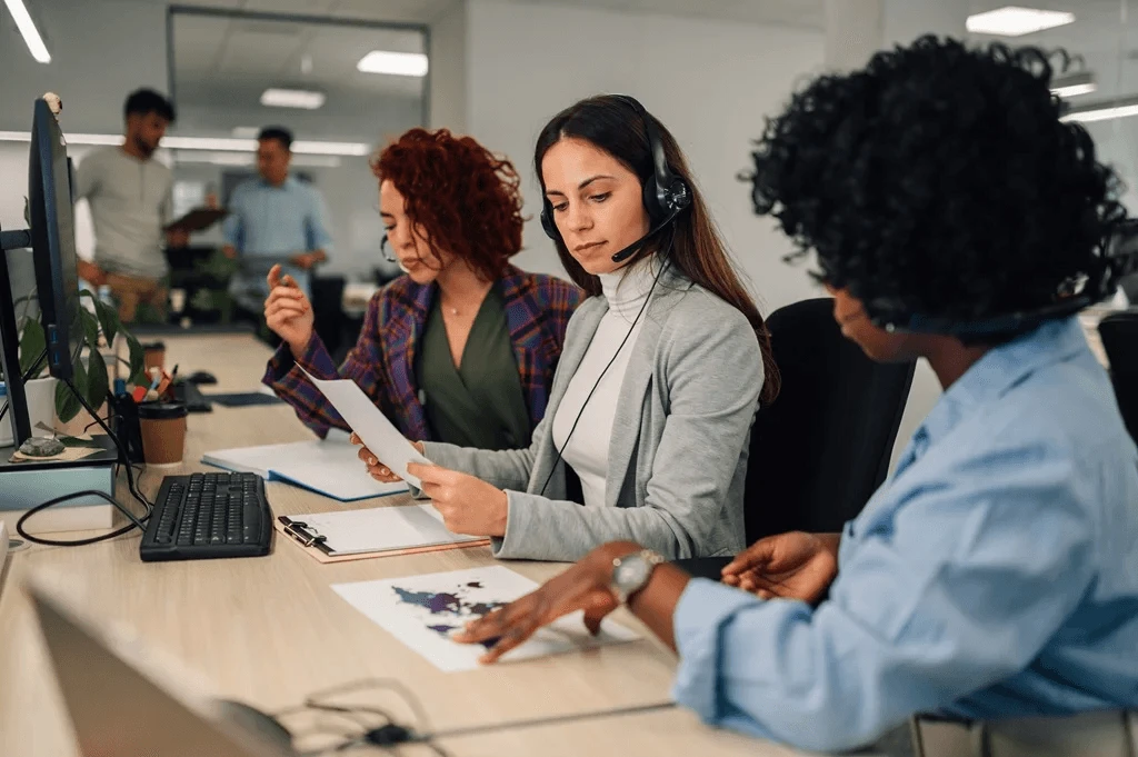 contact center agents discussing their current tasks