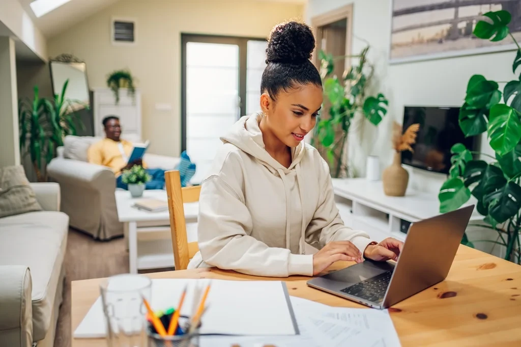 employee doing her tasks in a work-from-home-setup