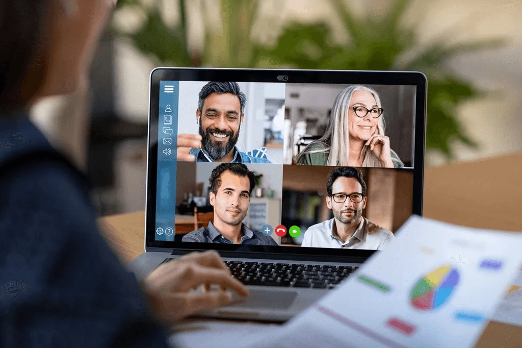 executive collaborating with her outsourced HR team virtually