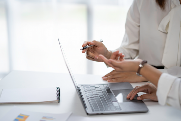 female hands on laptop keyboard woman using laptop