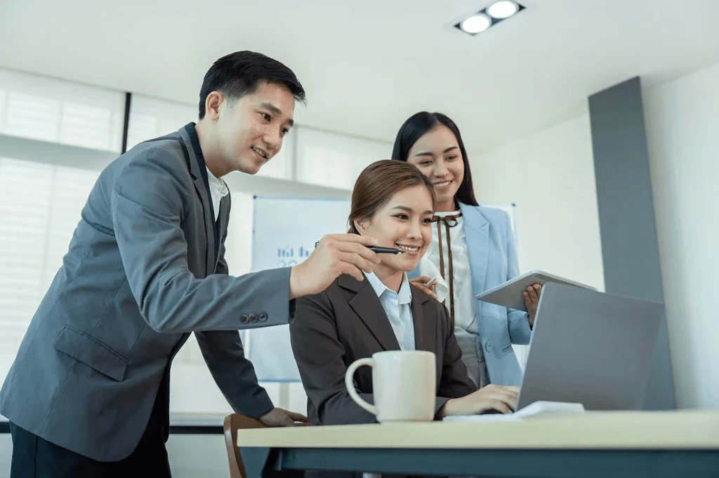 Filipino outsourcing team discussing a project