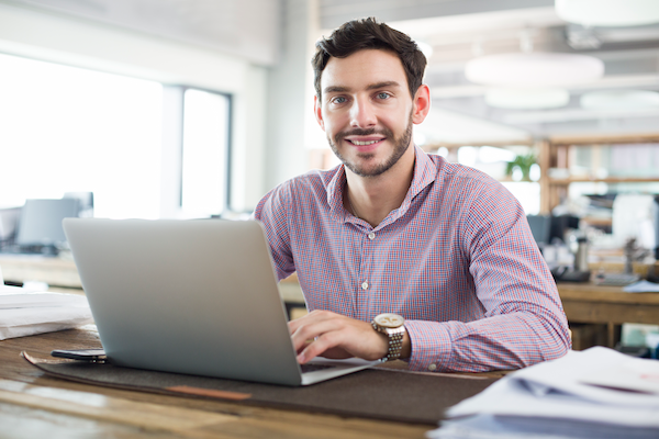 male architect working with laptop in the office