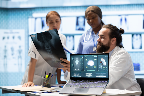 medical professionals examine anatomy