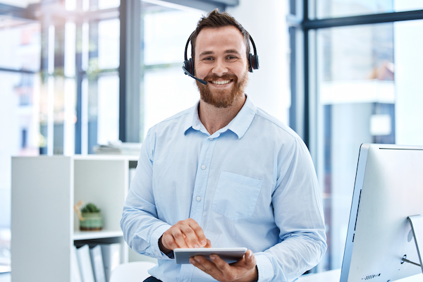 portrait of a young call centre agent working