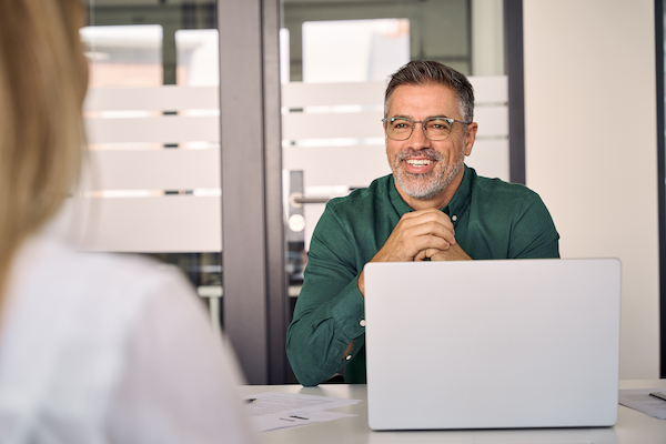 smiling older business man hr having conversation