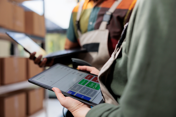 stockroom colleagues analyzing inventory