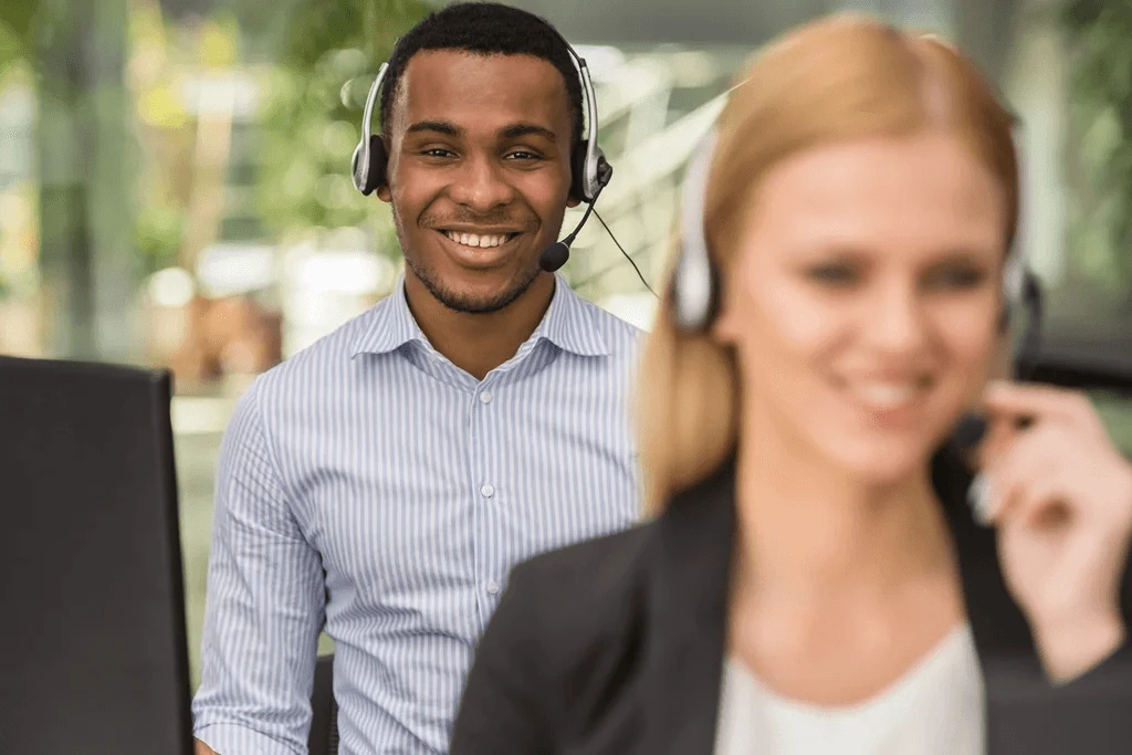 team of customer support agents in their work stations