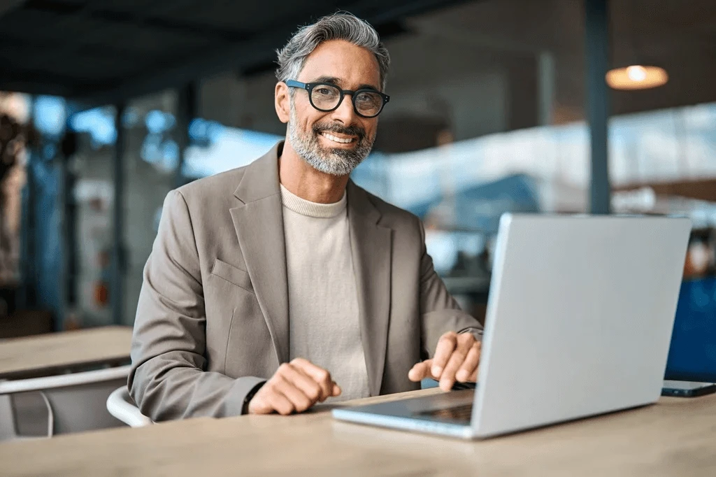 upper management employee researching how to benefit from outsourcing bookkeeping