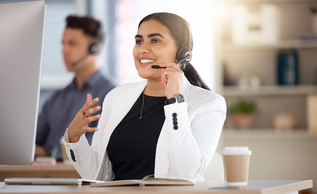 woman call center and computer with headset