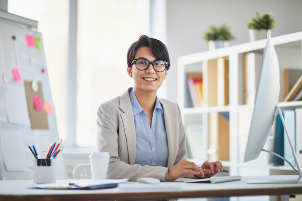 woman email support and computer with glasses