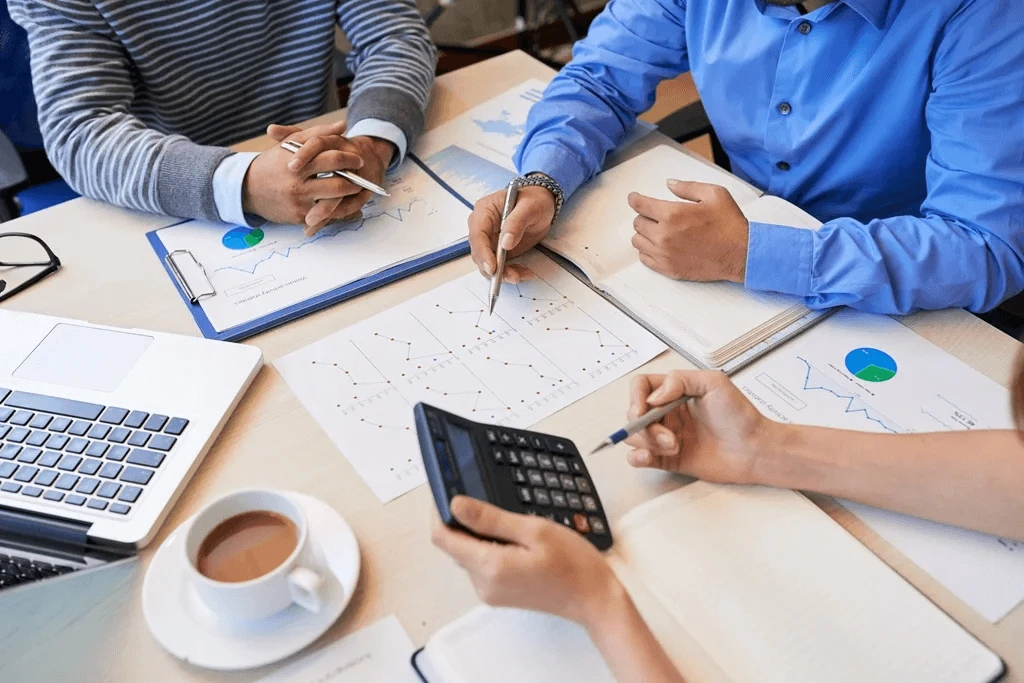 team of accountants and bookkeepers working together for a financial statement