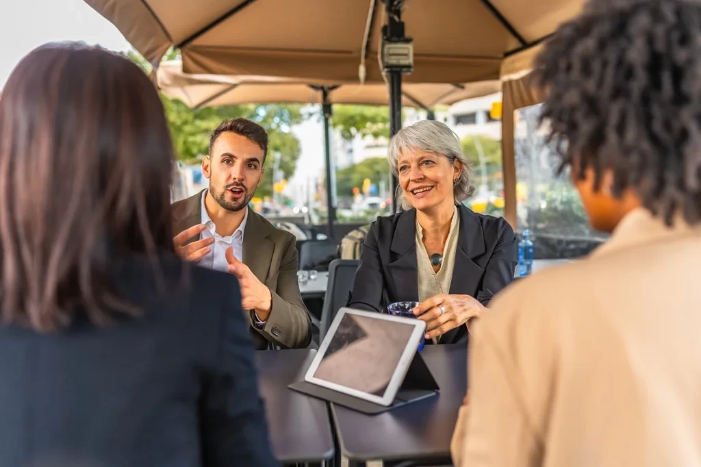 business owners discussing their ongoing partnership