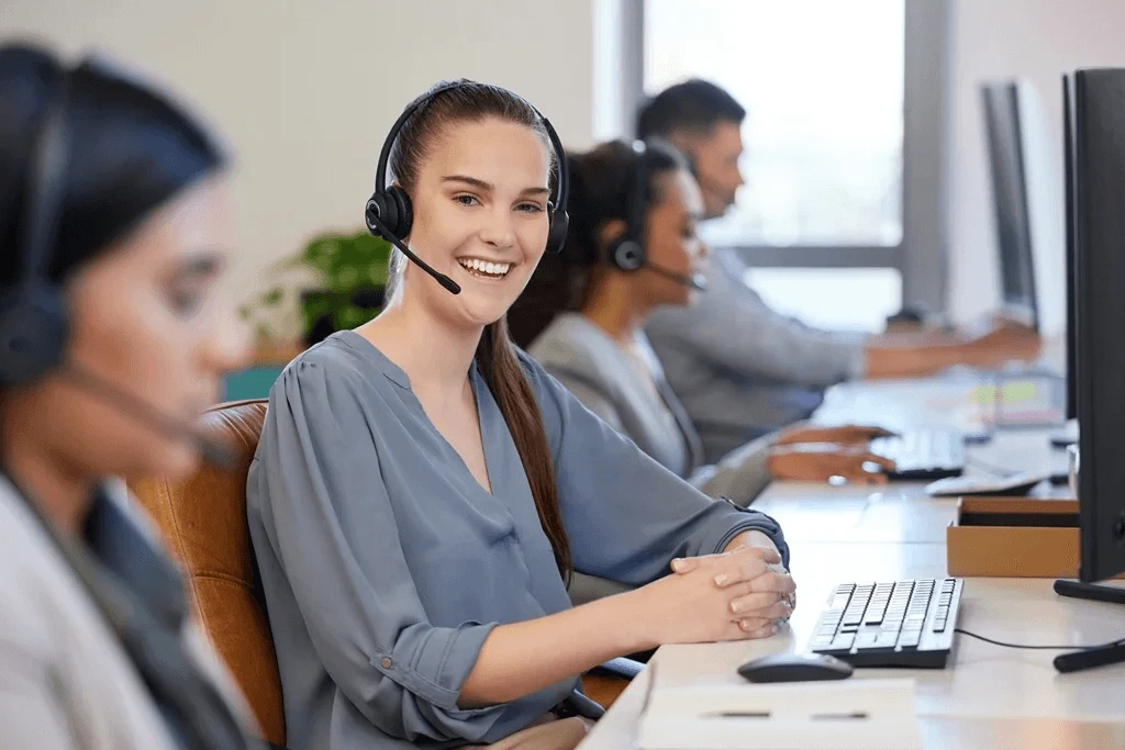 busy customer service agents in front of their computers