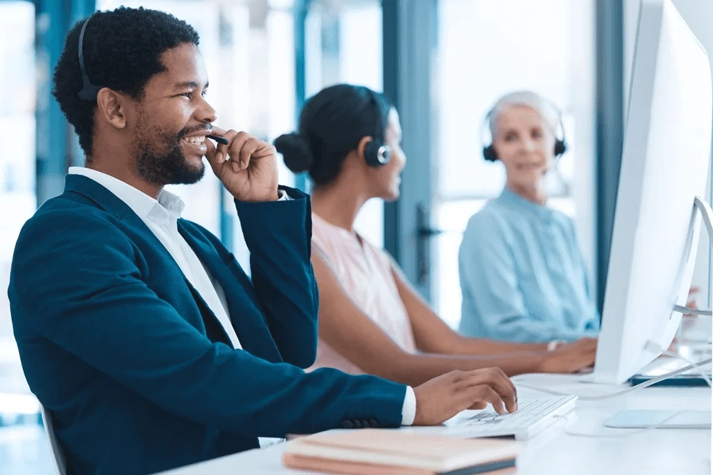 cheerful contact center agent handling a client call