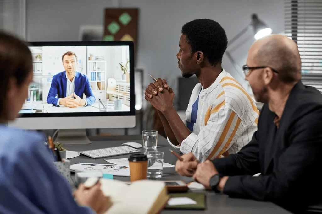 virtual meeting between a business owner and an outsourced team