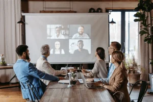 business having a video conference with an outsourcing team