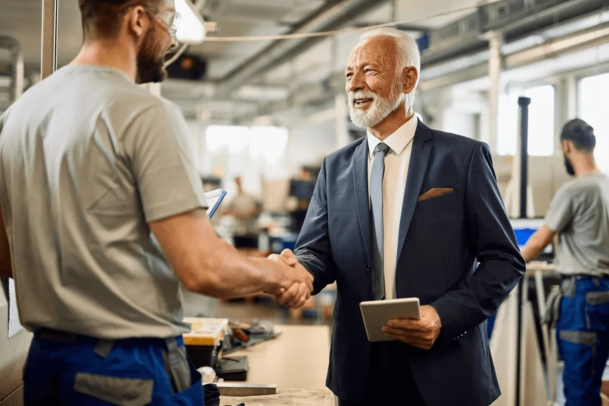 business owners shaking hands after their meeting