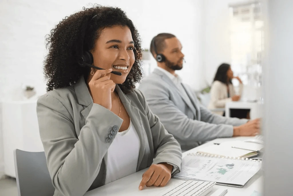 busy call center agent handling a customer call confidently