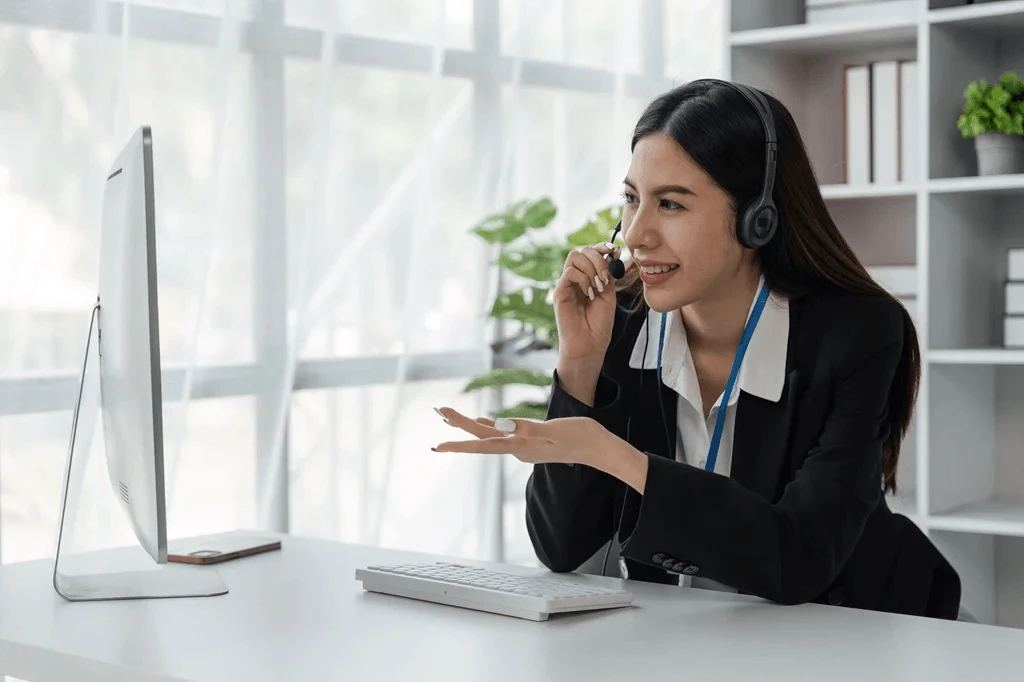 enthusiastic customer service agent carefully asking details from client