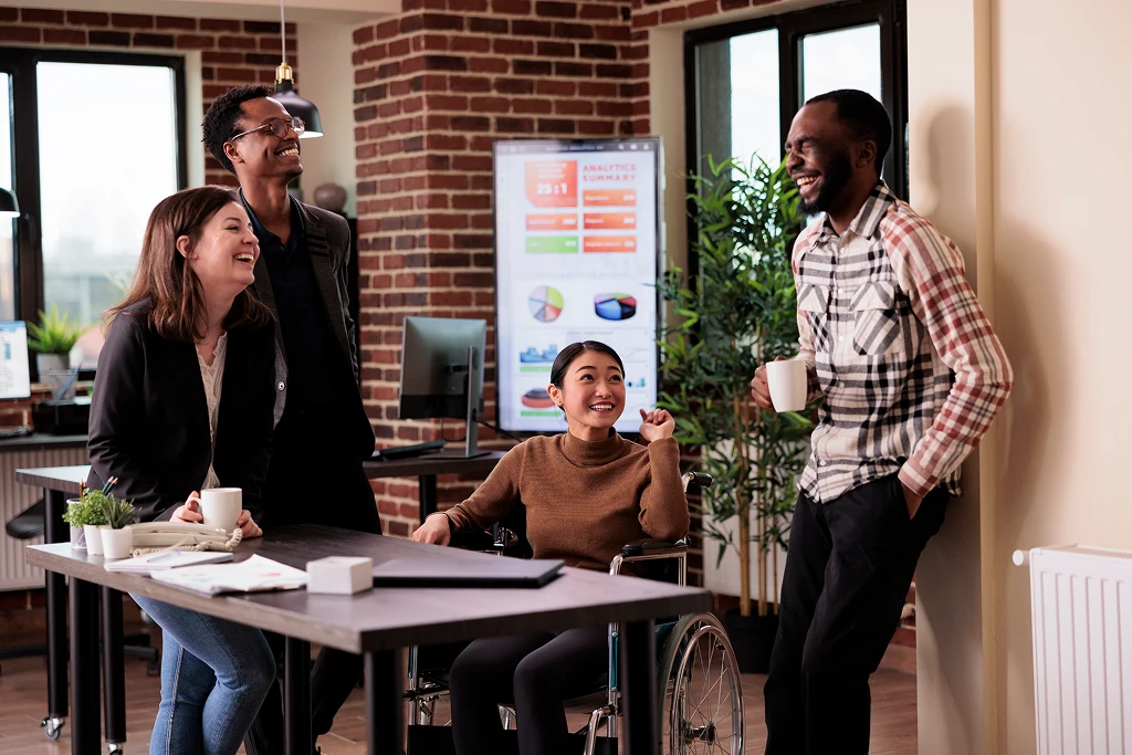 diverse group of people having fun in business workplace on break