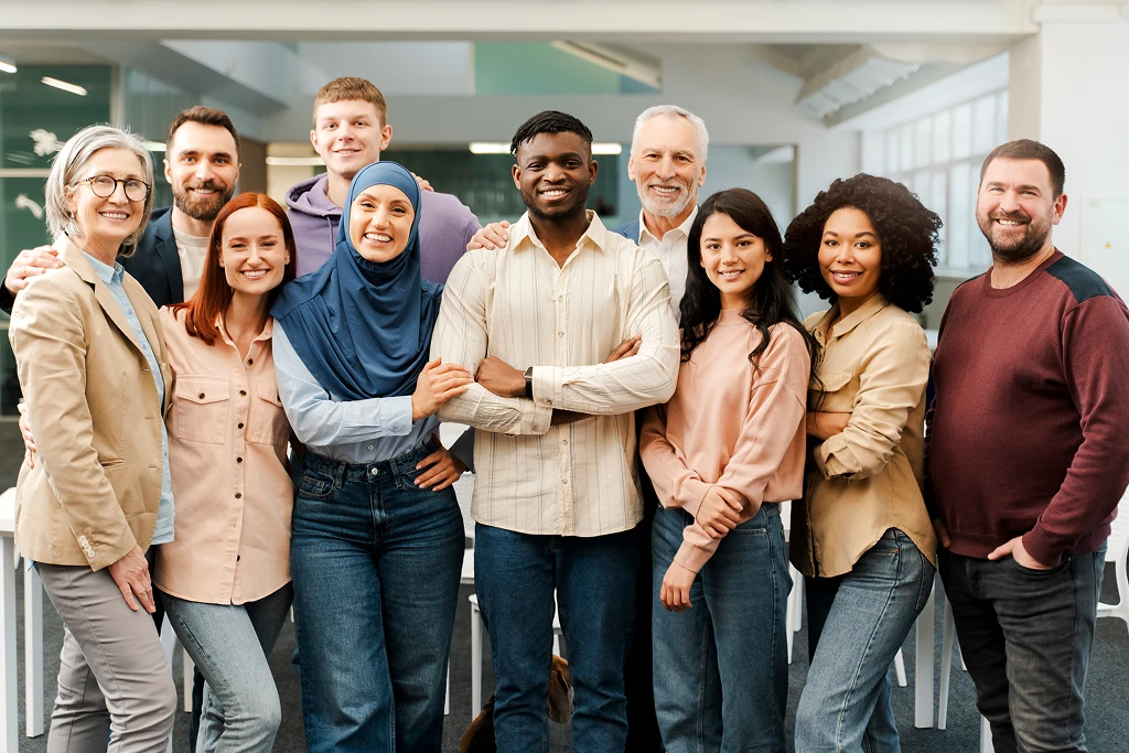 group portrait of multicultural marketing team looking at camera