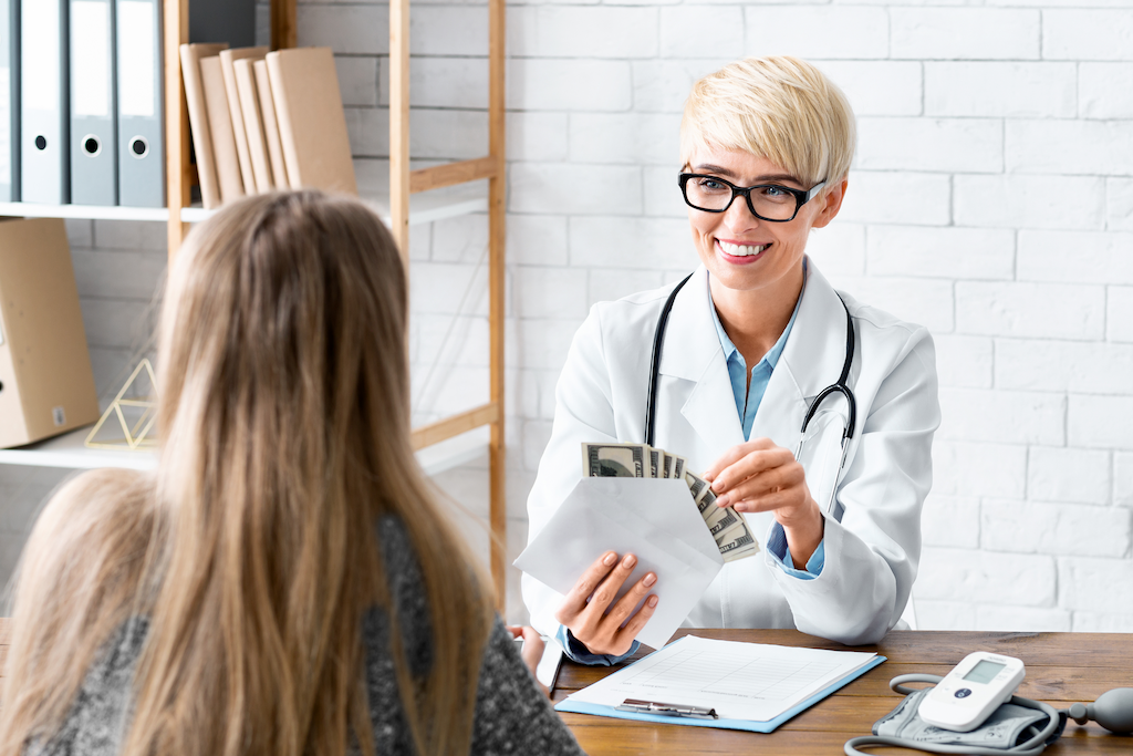 smiling woman because of revenue cycle management