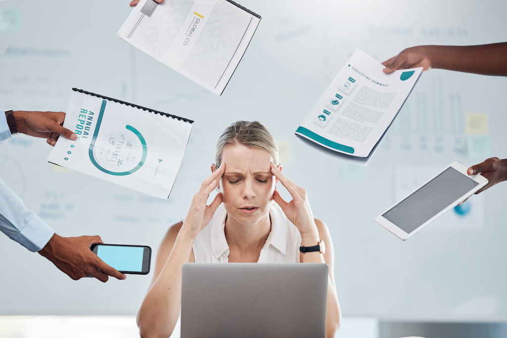 stressed business woman working on data management strategy