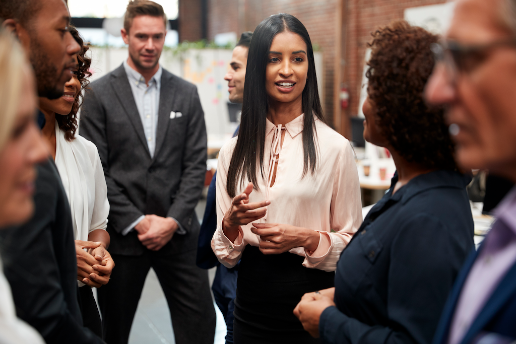 business team standing having informal meeting