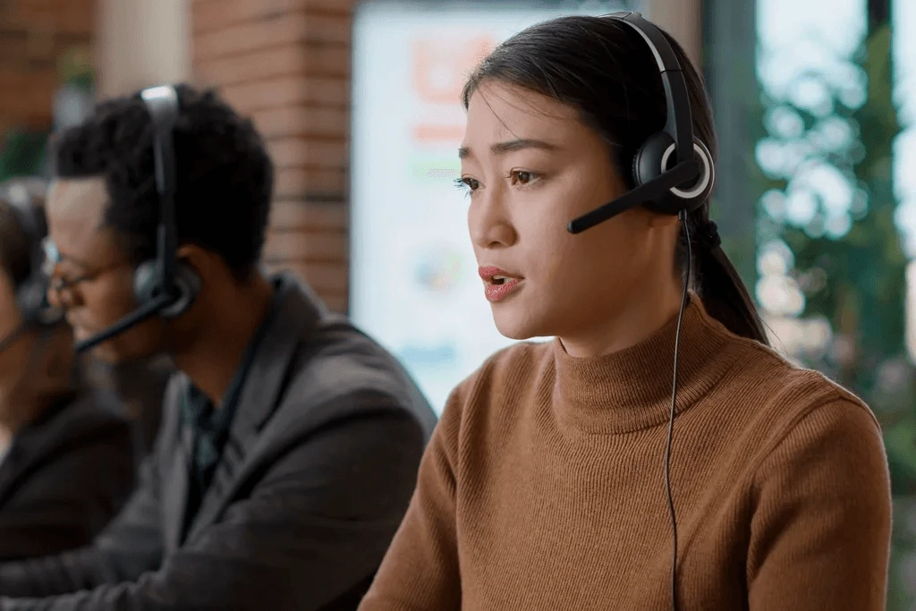 customer service agent listening to the feedback of a client