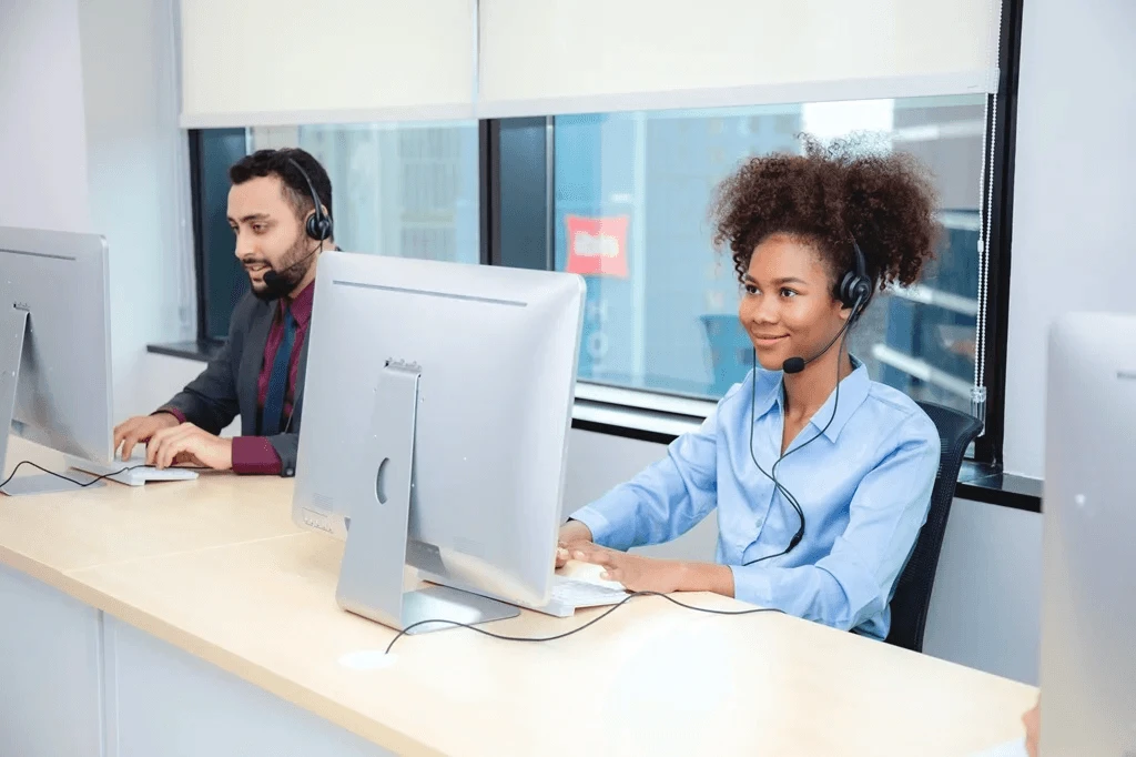 customer service agent attentively listening to a client during a call
