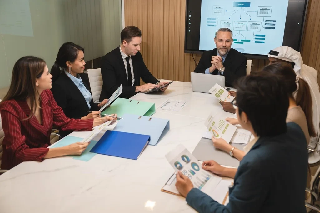business meeting discussing potential outsourcing to third-party providers