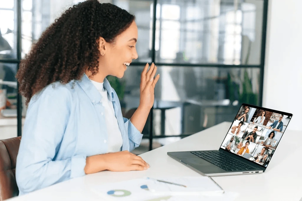 business owner virtually meeting her outsourcing team