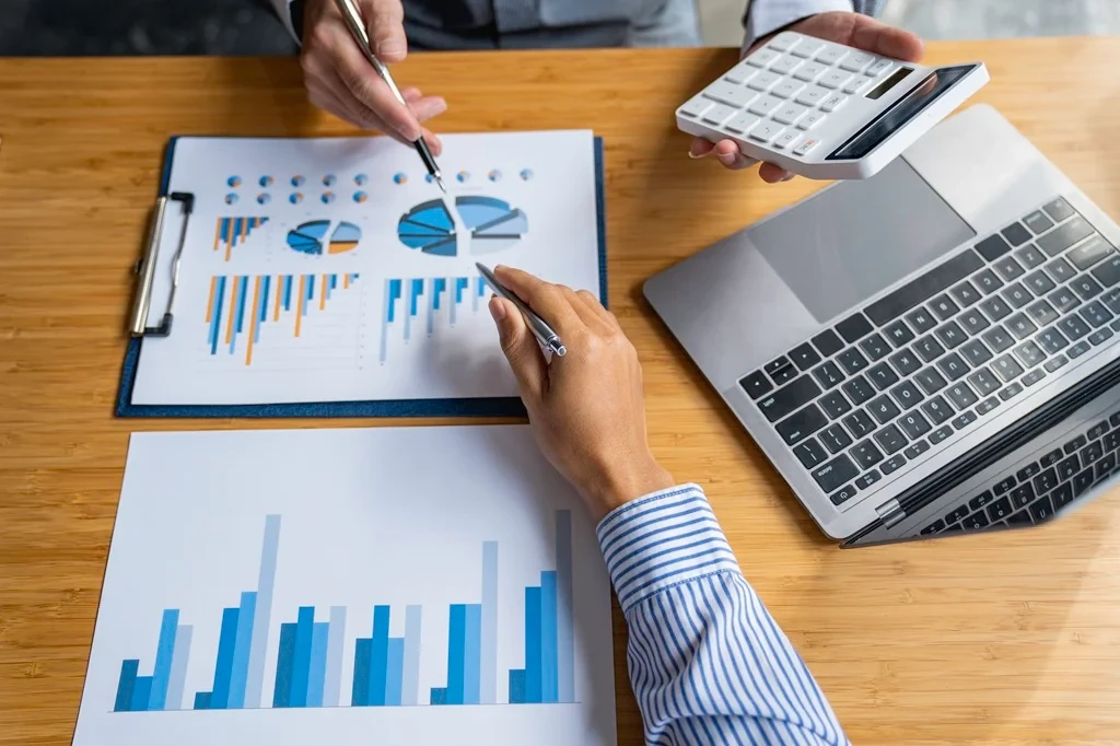 businesspeople analyzing the financial data of their operations